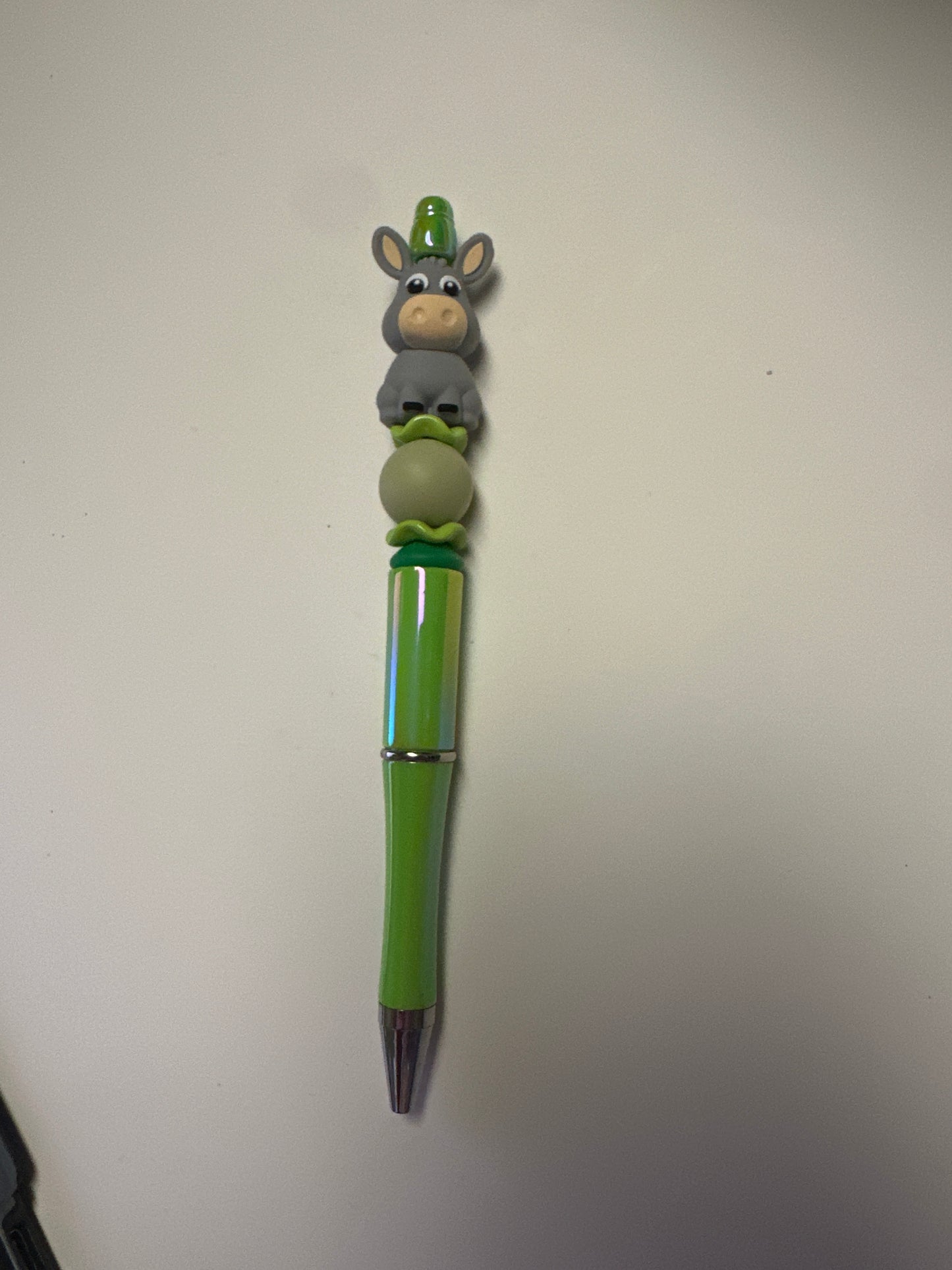 Beaded donkey with lime green pen