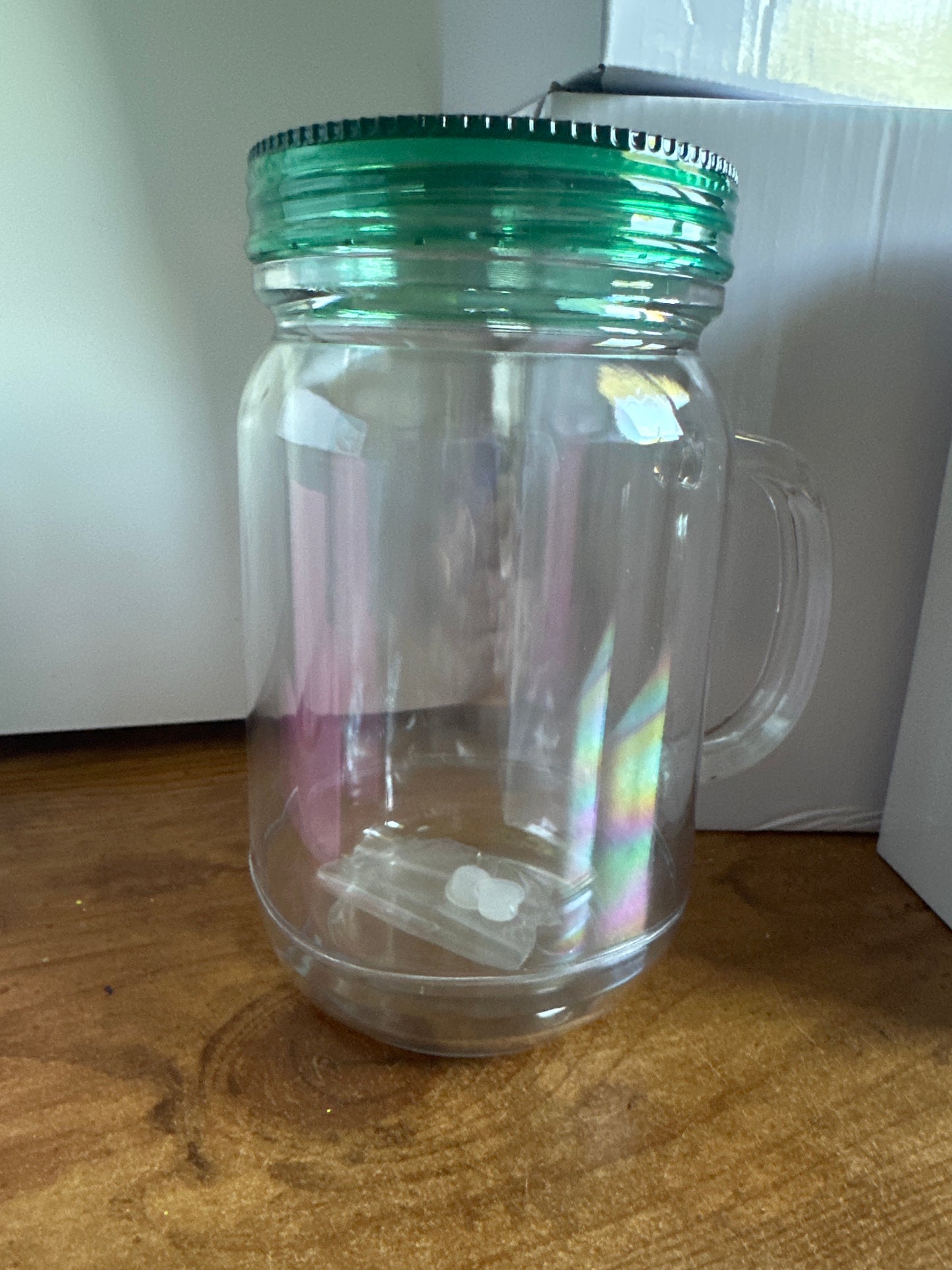 Dark green lid snowglobe tumbler 20 ounce
