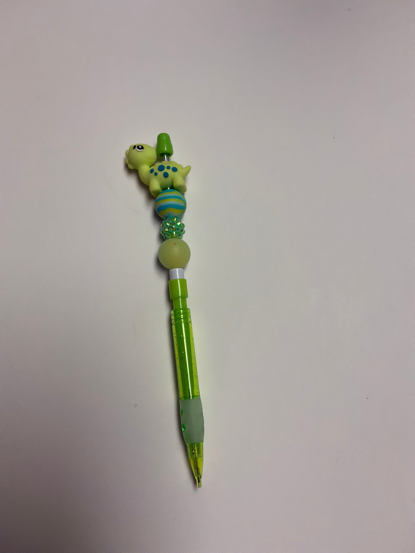 beaded light green Dino pencil