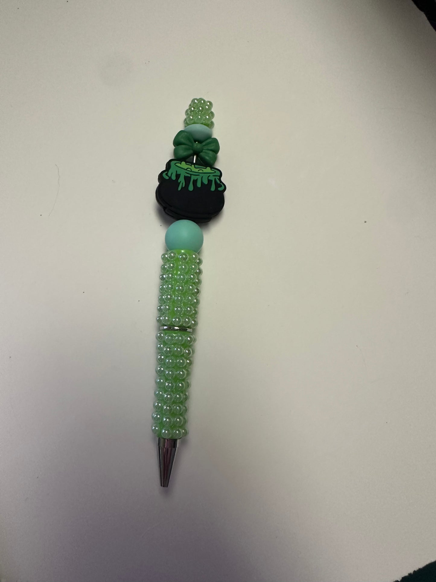 Lime green pearl pen with green cauldron focal