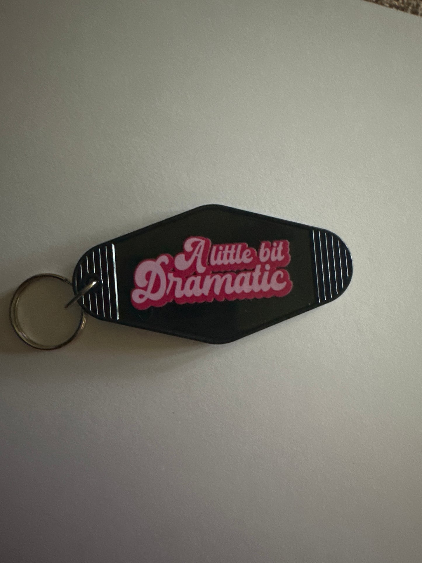 A little bit dramatic black keychain