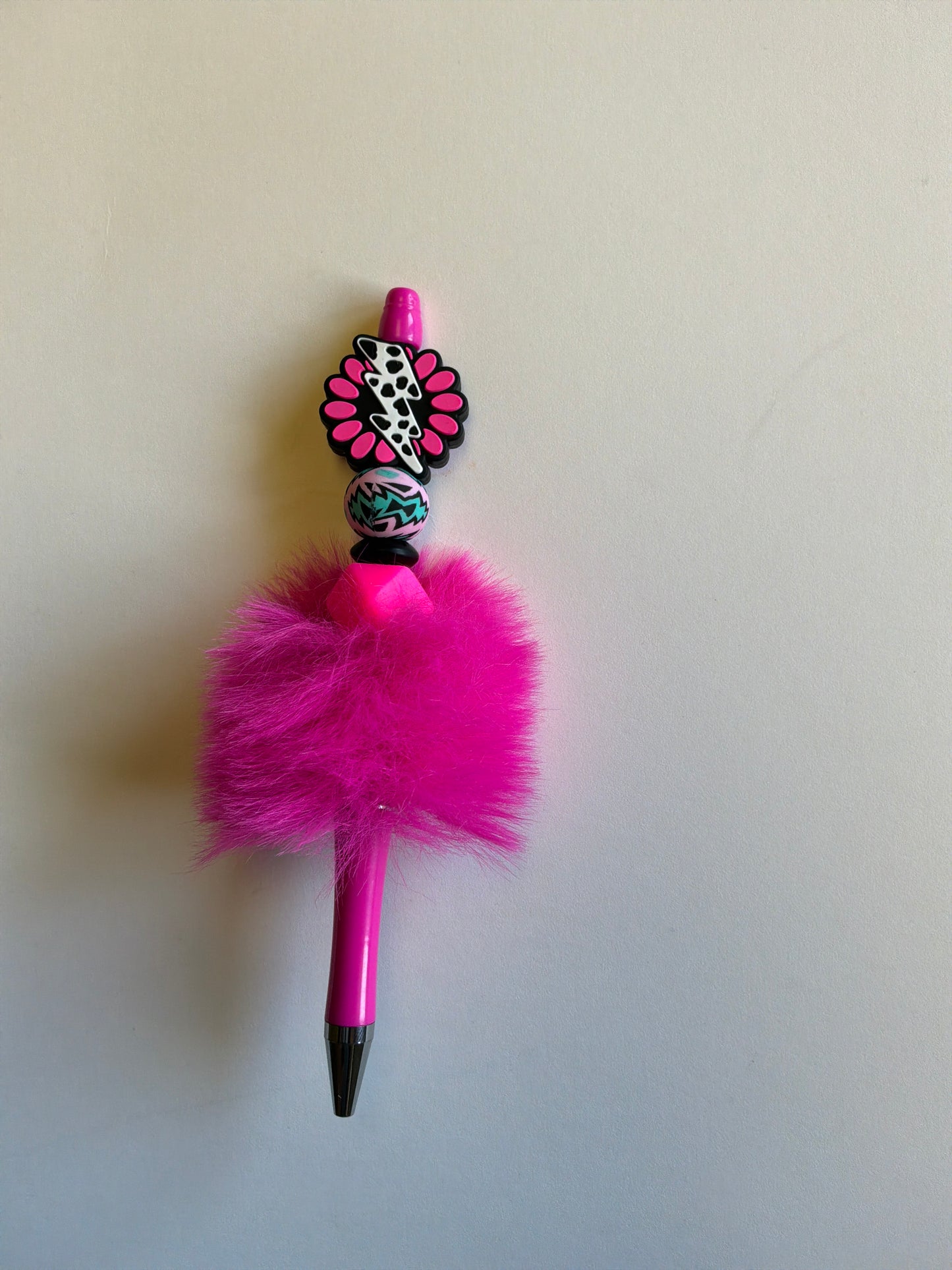 Beaded pink concho with lightning bolt on pink fluffy pen