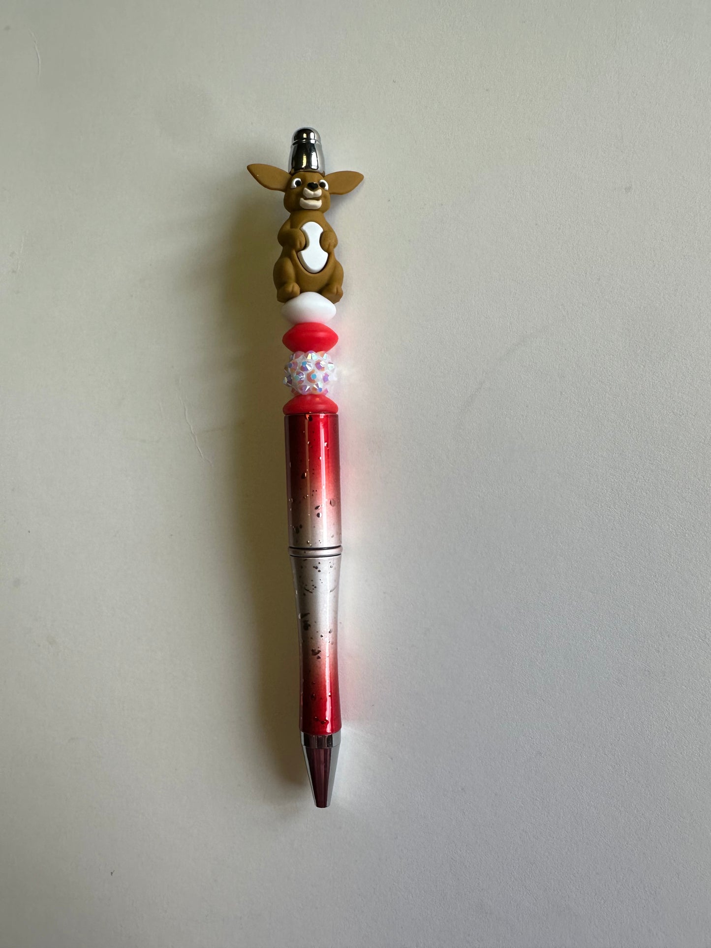 beaded Kangaroo on red and silver flake pen