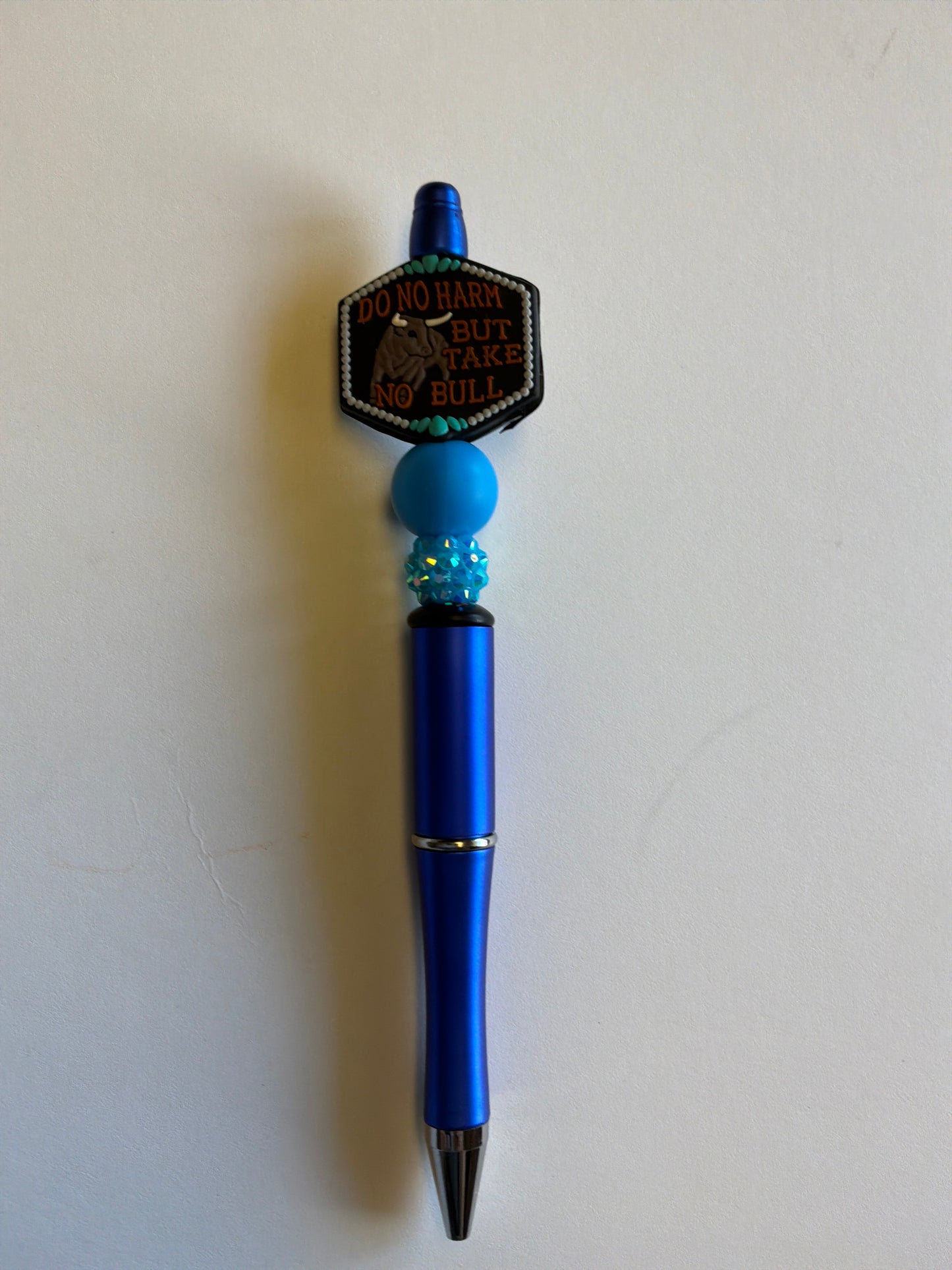 Beaded take no bull on a blue metallic pen