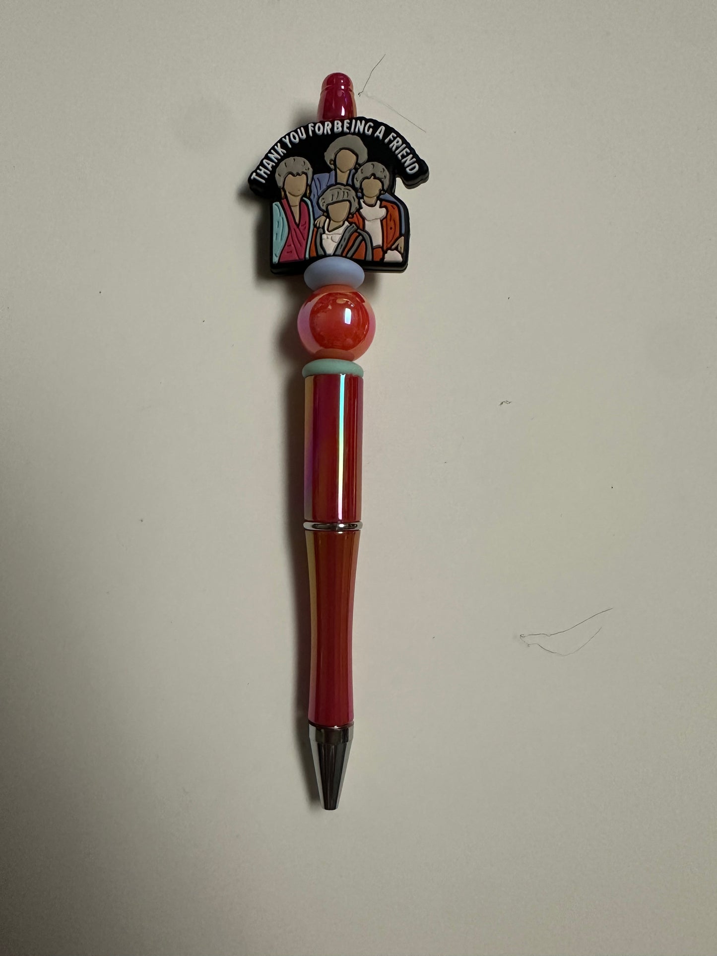 Glossy coral pen with Golden friends focal