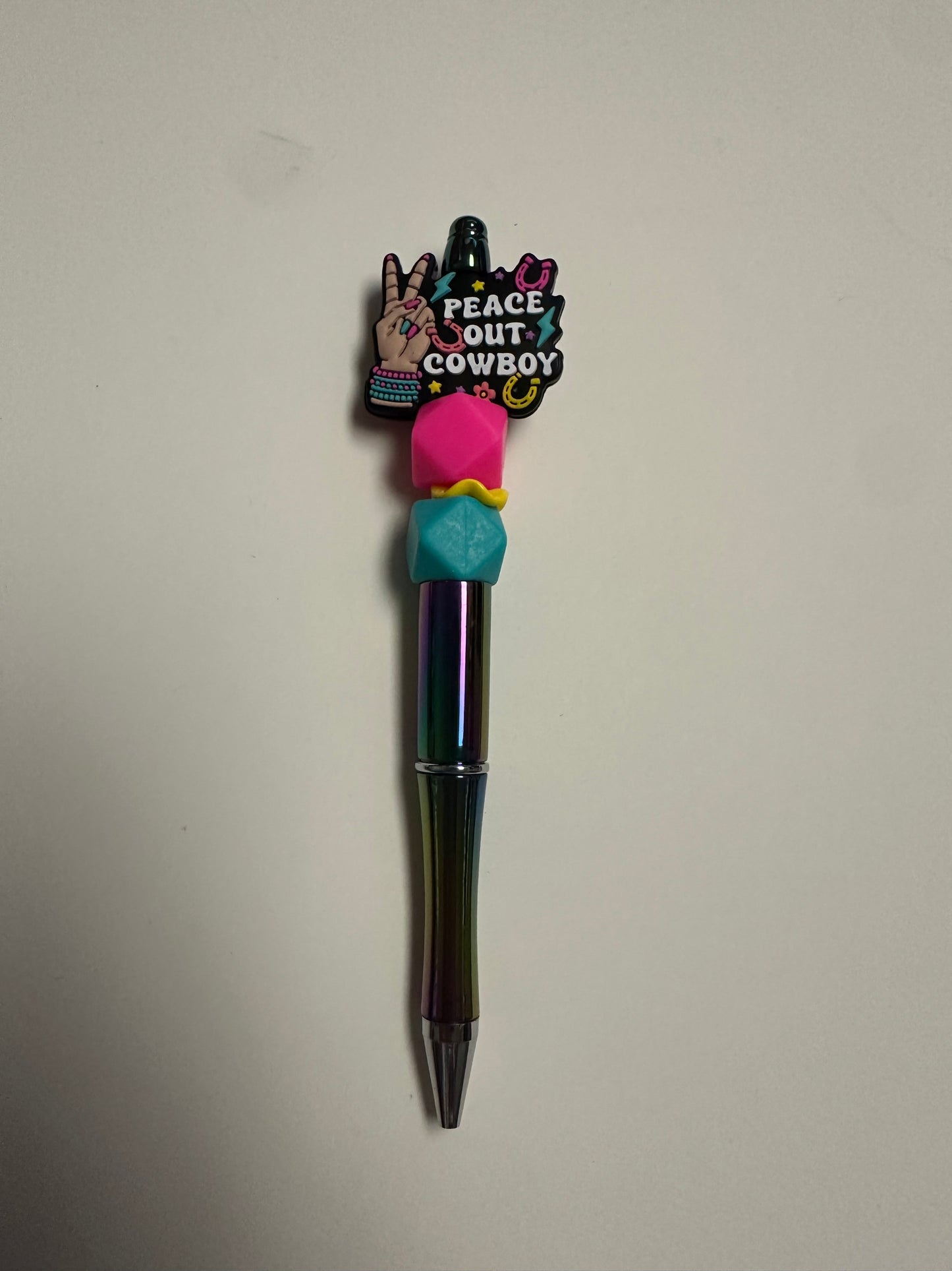Multicolor pen with peace out cowboy focal
